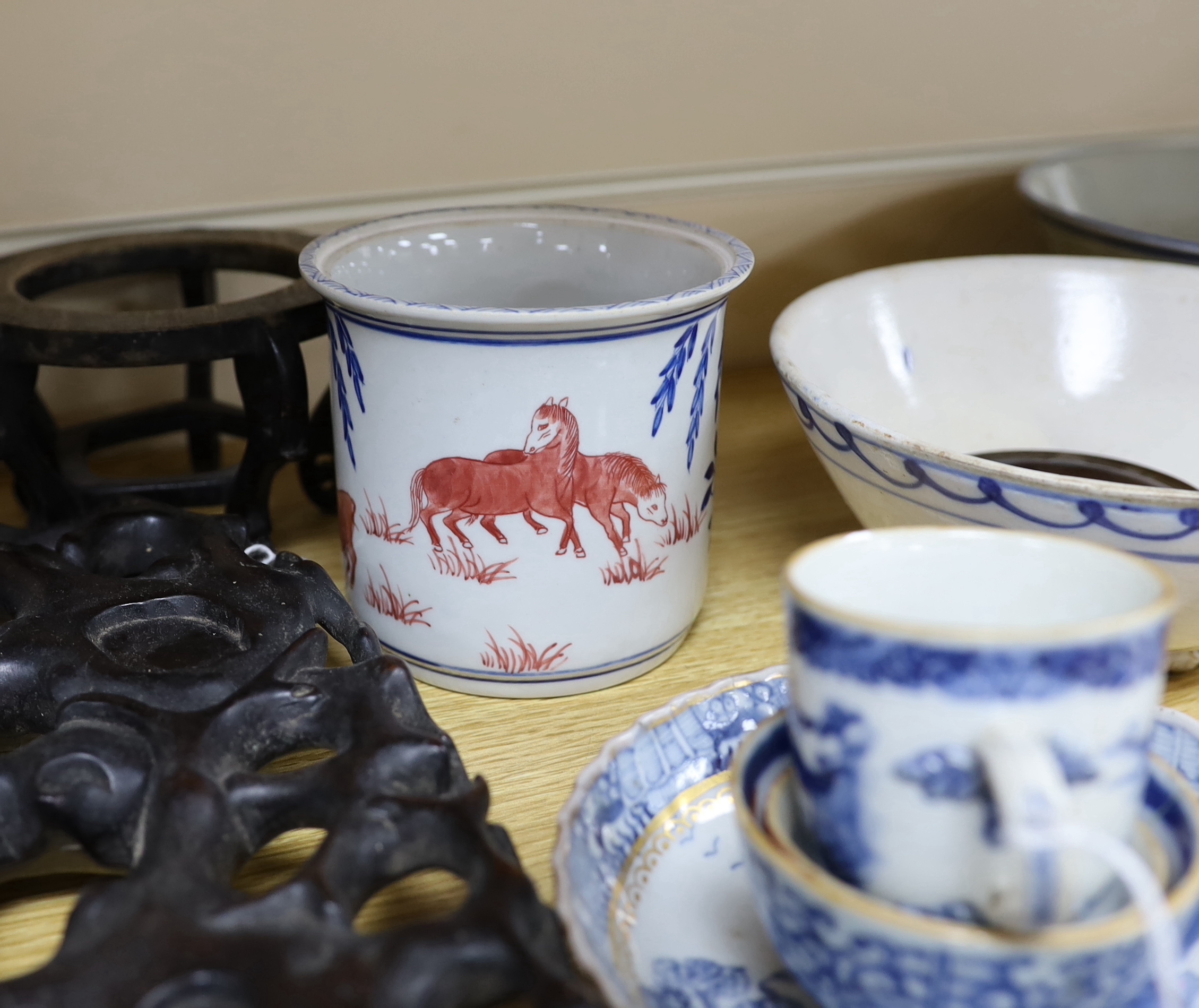 A collection of Chinese hardwood stands and a soapstone example, largest 29cm wide